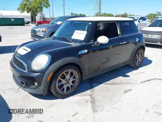 2011 MINI Hardtop S with VIN WMWSV3C5XBTY22399, listed as a IAAI auction lot 41868705 with 134,516 mi miles and . Bid and sale history available at DreamBid. Image 2.