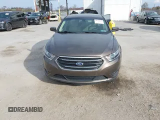 2015 Ford Taurus SEL with VIN 1FAHP2H87FG199865, listed as a IAAI auction lot 40760225 with 77,782 mi miles. Bid and sale history available at carsss.com. Image 12.