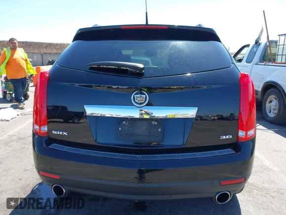 2012 Cadillac SRX Performance Collection z VIN 3GYFNBE30CS659973, wystawiony jako IAAI lot #42555119 z przebiegiem 141 842 mil mil oraz . Historia ofert i sprzedaży dostępna na DreamBid. Obrazek 16.