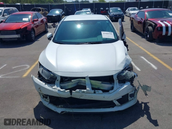 2020 Honda Civic LX with VIN 2HGFC2F61LH568767, listed as a IAAI auction lot 41909755 with 56,213 mi miles and . Bid and sale history available at DreamBid. Image 13.