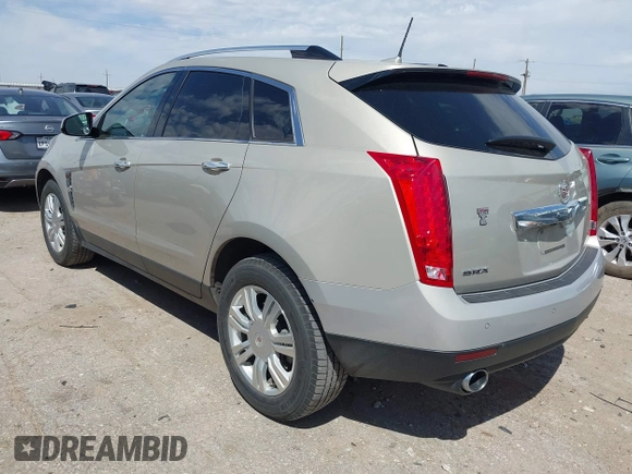 2011 Cadillac SRX Luxury Collection with VIN 3GYFNAEY7BS673549, listed as a IAAI auction lot 42068397 with 71,092 mi miles and . Bid and sale history available at DreamBid. Image 3.