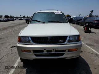 1997 Mitsubishi Montero z VIN JA4LS31P4VP021124, wystawiony jako Copart lot #55267115 z przebiegiem 320 661 mil mil oraz Tytuł czysty. Historia ofert i sprzedaży dostępna na DreamBid. Obrazek 5.