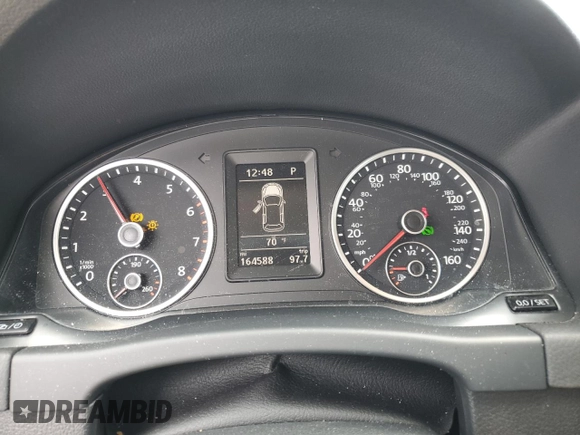 2017 Volkswagen Tiguan S with VIN WVGBV7AX8HK007434, listed as a Copart auction lot 53706165 with 164,588 mi miles and Salvage Title. Bid and sale history available at DreamBid. Image 9.