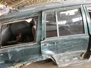 1996 Jeep Grand Cherokee Laredo with VIN 1J4GZ58S6TC304597, listed as a Copart auction lot 52962545 with Not provided miles and Salvage title. Bid and sale history available at DreamBid. Image 10.