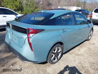 2017 Toyota Prius Two with VIN JTDKARFUXH3052105, listed as a IAAI auction lot 41980889 with 23,753 mi miles. Bid and sale history available at carsss.com. Image 4.