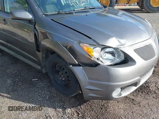 2007 Pontiac Vibe with VIN 5Y2SL65857Z433353, listed as a IAAI auction lot 41983127 with 256,547 mi miles. Bid and sale history available at carsss.com. Image 6.