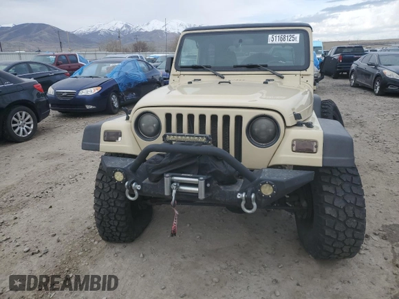 2001 Jeep Wrangler Sport с VIN 1J4FA49S71P312113, выставлен на аукционе Copart как лот 51168125 с пробегом 120 683 миль миль и Списание • Salvage title. История ставок и продаж доступна на DreamBid. Изображение 5.