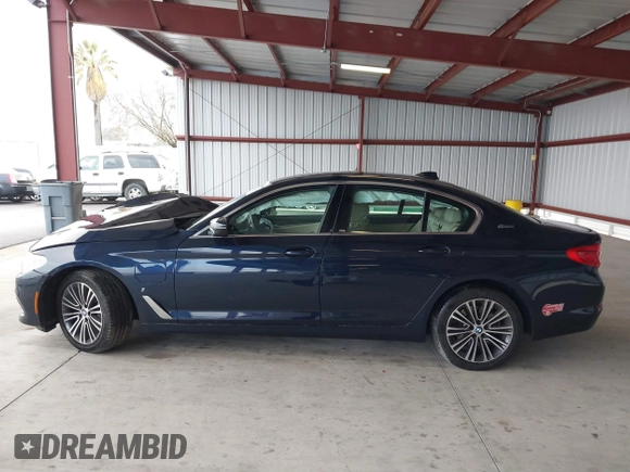 2019 BMW 5 Series 530e with VIN WBAJA9C50KB254535, listed as a IAAI auction lot 41094049 with 57,874 mi miles and . Bid and sale history available at DreamBid. Image 14.