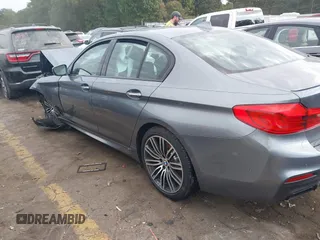 2018 BMW 5 Series M550i xDrive with VIN WBAJB9C53JB286035, listed as a IAAI auction lot 40590380 with 57,072 mi miles and . Bid and sale history available at carsss.com. Image 14.