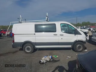 2018 Ford Transit with VIN 1FTYE1YM1JKB29601, listed as a IAAI auction lot 42085587 with 146,846 mi miles and . Bid and sale history available at DreamBid. Image 14.
