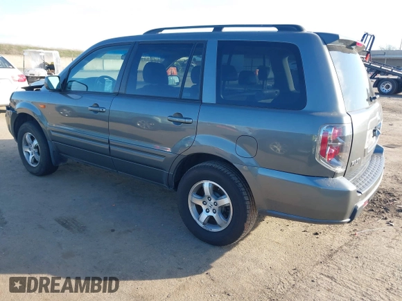 2007 Honda Pilot EX-L with VIN 5FNYF28797B001772, listed as a IAAI auction lot 41320270 with 220,227 mi miles. Bid and sale history available at carsss.com. Image 3.