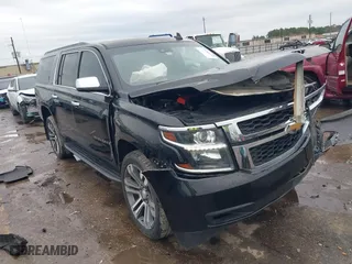 2018 Chevrolet Suburban LT with VIN 1GNSCHKC7JR129573, listed as a IAAI auction lot 41309111 with 155,341 mi miles. Bid and sale history available at carsss.com. Image 1.