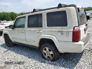 2010 Jeep Commander Sport with VIN 1J4RH4GK0AC103539, listed as a Copart auction lot 54136675 with 243,238 mi miles and Clean Title. Bid and sale history available at carsss.com. Image 2.