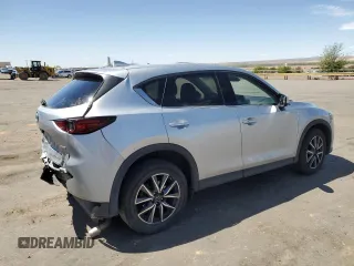 2018 Mazda CX-5 Grand Touring with VIN JM3KFBDM3J0319157, listed as a Copart auction lot 53891095 with 133,189 mi miles and Salvage Title. Bid and sale history available at DreamBid. Image 3.