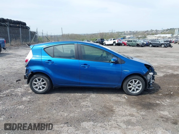 2014 Toyota Prius One with VIN JTDKDTB33E1565723, listed as a IAAI auction lot 42070826 with 145,811 mi miles and . Bid and sale history available at DreamBid. Image 14.