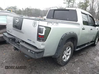 2010 Nissan Titan SE with VIN 1N6BA0EK3AN308362, listed as a IAAI auction lot 41406474 with 316,394 mi miles. Bid and sale history available at carsss.com. Image 4.