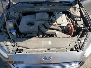 2013 Ford Fusion SE Hybrid z VIN 3FA6P0LU0DR274279, wystawiony jako Copart lot #57462315 z przebiegiem 272 825 mil mil oraz Szkoda całkowita • Salvage title. Historia ofert i sprzedaży dostępna na DreamBid. Obrazek 11.