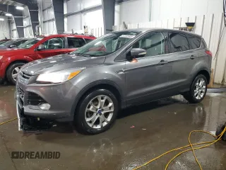 2013 Ford Escape SEL z VIN 1FMCU9H95DUA25494, wystawiony jako Copart lot #57235905 z przebiegiem 158 743 mil mil oraz Szkoda całkowita • Salvage title. Historia ofert i sprzedaży dostępna na DreamBid. Obrazek 1.