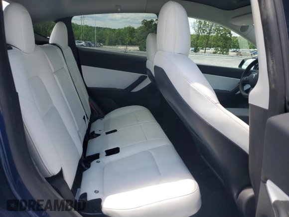 2022 Tesla Model Y Long Range z VIN 7SAYGDEE4NF426893, wystawiony jako Copart lot #55809275 z przebiegiem 16 083 mil mil oraz Szkoda całkowita • Salvage title. Historia ofert i sprzedaży dostępna na DreamBid. Obrazek 10.