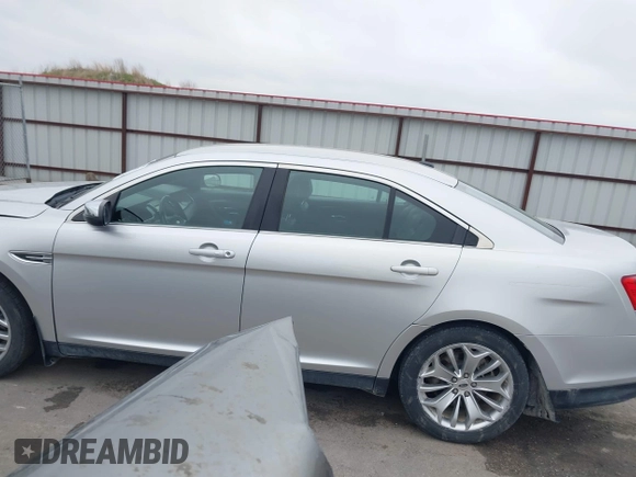 2015 Ford Taurus Limited with VIN 1FAHP2F81FG171224, listed as a IAAI auction lot 42250645 with 125,395 mi miles and . Bid and sale history available at DreamBid. Image 14.