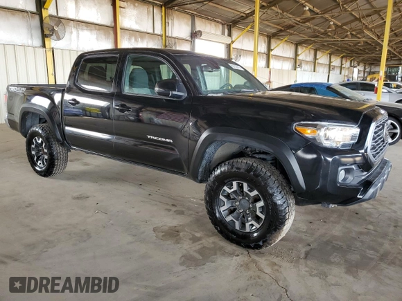 2022 Toyota Tacoma SR with VIN 3TMCZ5AN0NM475548, listed as a Copart auction lot 59152015 with 56,020 mi miles and Salvage title. Bid and sale history available at DreamBid. Image 4.