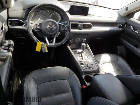 2018 Mazda CX-5 Grand Touring z VIN JM3KFADM2J1381752, wystawiony jako Copart lot #56889835 z przebiegiem 96 820 mil mil oraz Szkoda całkowita • Salvage title. Historia ofert i sprzedaży dostępna na DreamBid. Obrazek 8.