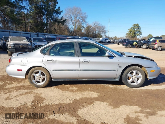 1999 Ford Taurus SE with VIN 1FAFP53S6XA322930, listed as a IAAI auction lot 41422655 with 189,696 mi miles. Bid and sale history available at carsss.com. Image 13.