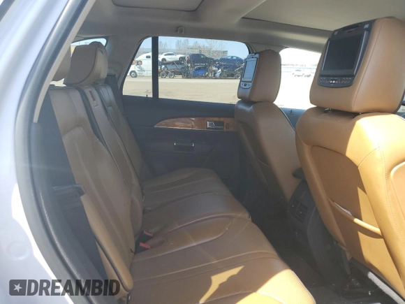 2011 Lincoln MKX z VIN 2LMDJ8JK3BBJ03668, wystawiony jako Copart lot #54588045 z przebiegiem 163 646 mil mil oraz Szkoda całkowita • Salvage title. Historia ofert i sprzedaży dostępna na DreamBid. Obrazek 11.