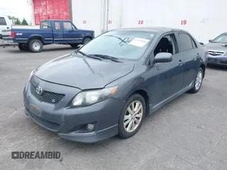 2009 Toyota Corolla with VIN 1NXBU40E39Z065572, listed as a IAAI auction lot 42138980 with 195,822 mi miles. Bid and sale history available at carsss.com. Image 2.