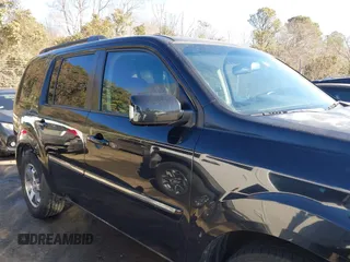 2010 Honda Pilot Touring with VIN 5FNYF4H95AB030531, listed as a IAAI auction lot 41441088 with 274,185 mi miles and . Bid and sale history available at carsss.com. Image 13.