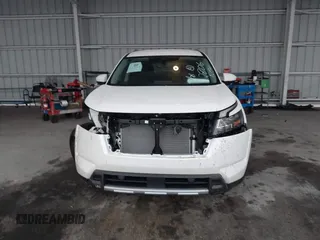 2024 Nissan Pathfinder SL z VIN 5N1DR3CA7RC312806, wystawiony jako IAAI lot #41354638 z przebiegiem 1 148 mil mil oraz . Historia ofert i sprzedaży dostępna na DreamBid. Obrazek 12.