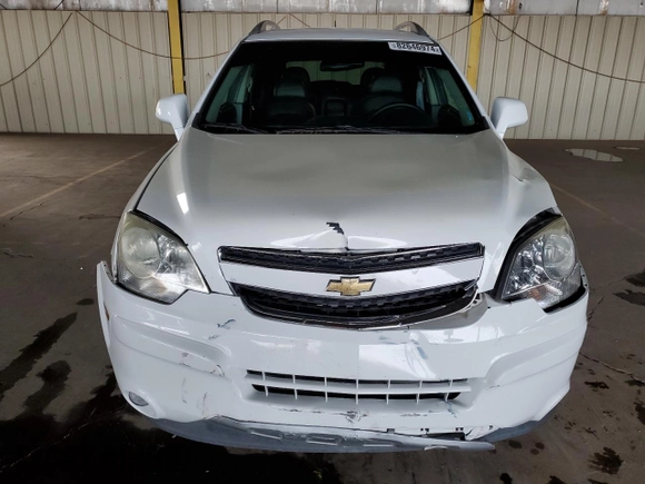 2013 Chevrolet Captiva Sport LTZ with VIN 3GNAL4EK0DS619409, listed as a Copart auction lot 82646974 with 90,590 mi miles and Salvage Title. Bid and sale history available at DreamBid. Image 5.