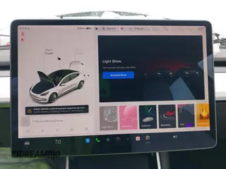 2020 Tesla Model 3 Standard Range Plus with VIN 5YJ3E1EA0LF741311, listed as a IAAI auction lot 41581931 with 43,284 mi miles. Bid and sale history available at carsss.com. Image 18.