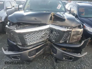 2017 Nissan Titan XD SL with VIN 1N6AA1F41HN548361, listed as a Copart auction lot 84654174 with 142,057 mi miles and Salvage Title. Bid and sale history available at carsss.com. Image 11.