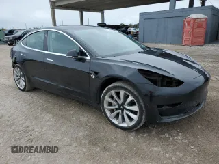 2019 Tesla Model 3 Mid Range with VIN 5YJ3E1EA7KF412426, listed as a Copart auction lot 55204205 with 73,230 mi miles and Non Repairable. Bid and sale history available at DreamBid. Image 4.