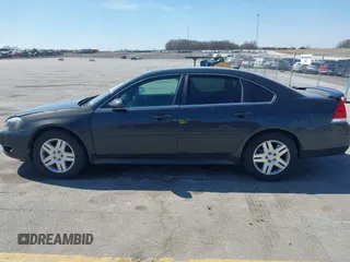 2013 Chevrolet Impala LT with VIN 2G1WB5E31D1163179, listed as a IAAI auction lot 41908130 with 190,801 mi miles and . Bid and sale history available at DreamBid. Image 14.