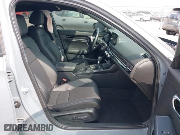 2025 Honda Civic Sport Touring z VIN 19XFL4H94SE000539, wystawiony jako IAAI lot #41777545 z przebiegiem 7 128 mil mil oraz . Historia ofert i sprzedaży dostępna na DreamBid. Obrazek 5.