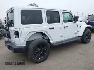 2023 Jeep Wrangler Sahara with VIN 1C4HJXEG5PW581632, listed as a IAAI auction lot 42462622 with 24,550 mi miles and . Bid and sale history available at DreamBid. Image 4.