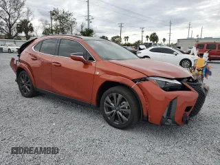 2023 Lexus UX 250h F Sport with VIN JTHR6JBHXP2143632, listed as a Copart auction lot 86048654 with 29,481 mi miles and Salvage title. Bid and sale history available at DreamBid. Image 4.