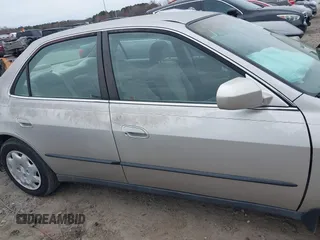 1999 Honda Accord LX z VIN 1HGCG5646XA147476, wystawiony jako IAAI lot #41752857 z przebiegiem 86 339 mil mil oraz . Historia ofert i sprzedaży dostępna na DreamBid. Obrazek 13.