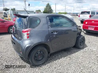 2012 Scion iQ with VIN JTNJJXB00CJ018659, listed as a IAAI auction lot 42232715 with 142,516 mi miles and . Bid and sale history available at DreamBid. Image 4.