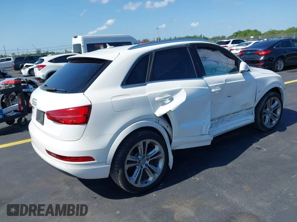 2016 Audi Q3 Premium Plus with VIN WA1BFCFS0GR014028, listed as a IAAI auction lot 42274987 with 64,667 mi miles and . Bid and sale history available at DreamBid. Image 4.