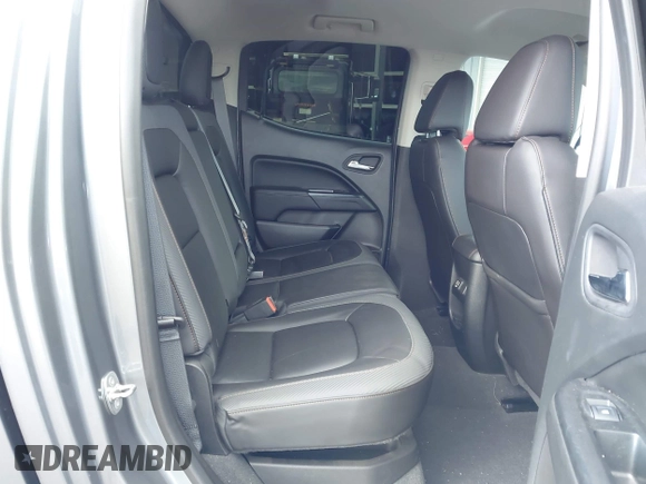 2021 GMC Canyon 4WD AT4 z VIN 1GTG6FEN8M1275345, wystawiony jako IAAI lot #42045878 z przebiegiem 68 299 mil mil oraz . Historia ofert i sprzedaży dostępna na DreamBid. Obrazek 8.
