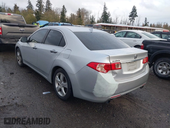 2012 Acura TSX Tech Pkg with VIN JH4CU2F62CC012290, listed as a IAAI auction lot 40765338 with 129,737 mi miles. Bid and sale history available at carsss.com. Image 3.