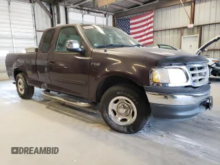 2000 Ford F-150 XL with VIN 1FTZX1726YKB41994, listed as a Copart auction lot 69300034 with Not provided miles and Salvage title. Bid and sale history available at DreamBid. Image 4.