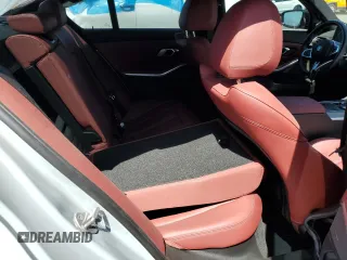 2023 BMW 3 Series 330i with VIN 3MW69FF00P8D52700, listed as a Copart auction lot 61629485 with 12,007 mi miles and Salvage title. Bid and sale history available at DreamBid. Image 10.