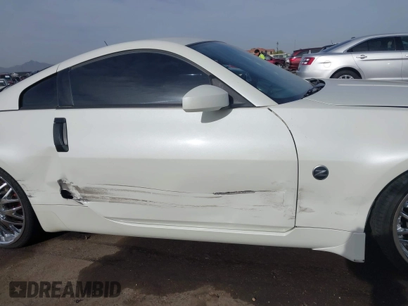 2004 Nissan 350Z Touring with VIN JN1AZ34D14M102966, listed as a IAAI auction lot 41921270 with 182,633 mi miles. Bid and sale history available at carsss.com. Image 14.