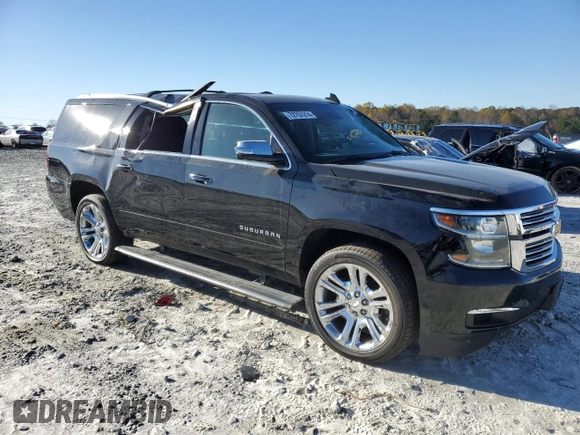 2019 Chevrolet Suburban Premier with VIN 1GNSKJKJXKR323704, listed as a Copart auction lot 72757214 with 150,404 mi miles and Salvage Title. Bid and sale history available at DreamBid. Image 4.