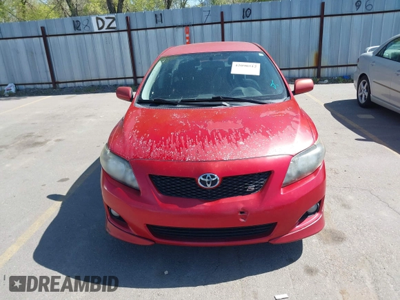 2009 Toyota Corolla with VIN 1NXBU40E09Z098951, listed as a IAAI auction lot 42090512 with 199,787 mi miles. Bid and sale history available at carsss.com. Image 6.