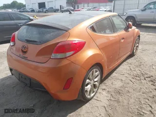 2012 Hyundai Veloster w/Gray Int with VIN KMHTC6AD5CU074516, listed as a IAAI auction lot 42061623 with 133,338 mi miles. Bid and sale history available at carsss.com. Image 4.